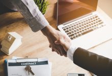 An acting agent shaking hands with a client