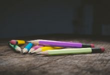 Several drawing pencils on a table