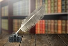 A poetry quill in a tub of ink