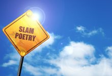 A yellow sign with "slam poetry" written on it