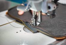 A leather bag on a sewing machine